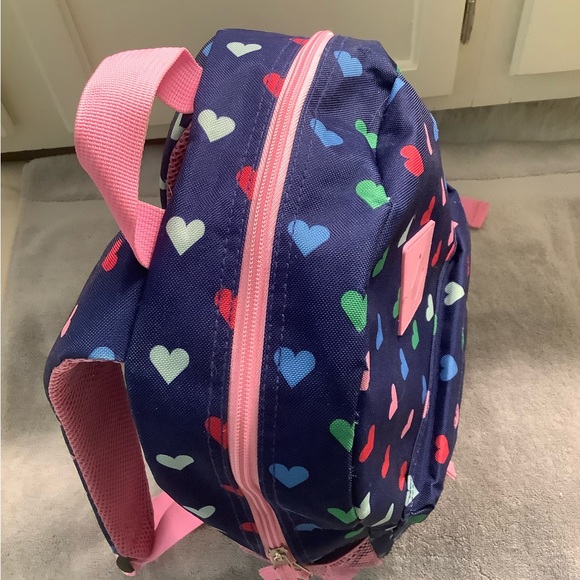 Protege colorful hearts on blue background backpack with pink accents. - Picture 5 of 7